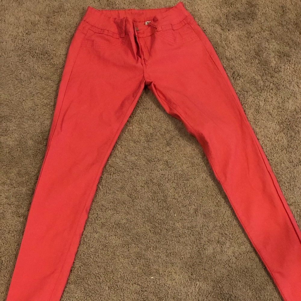 Bright orange skinny jeans